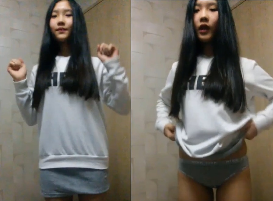 Cô gái trẻ nóng bỏng quyến rũ trong điệu nhảy gợi cảm